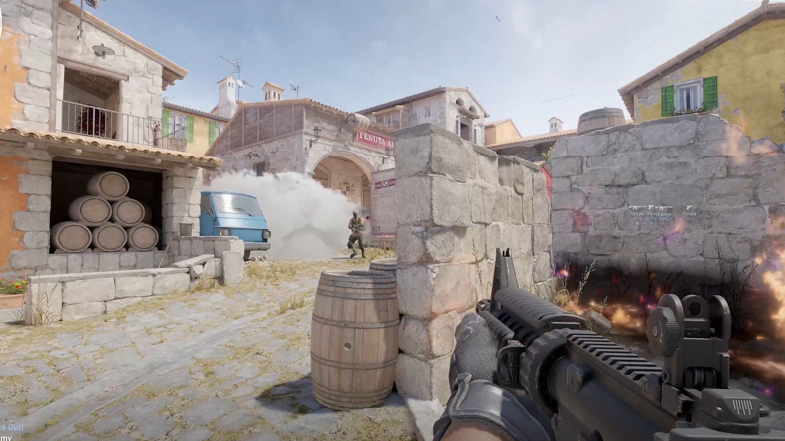 CS2 players pushing through a smoke grenade on Inferno banana