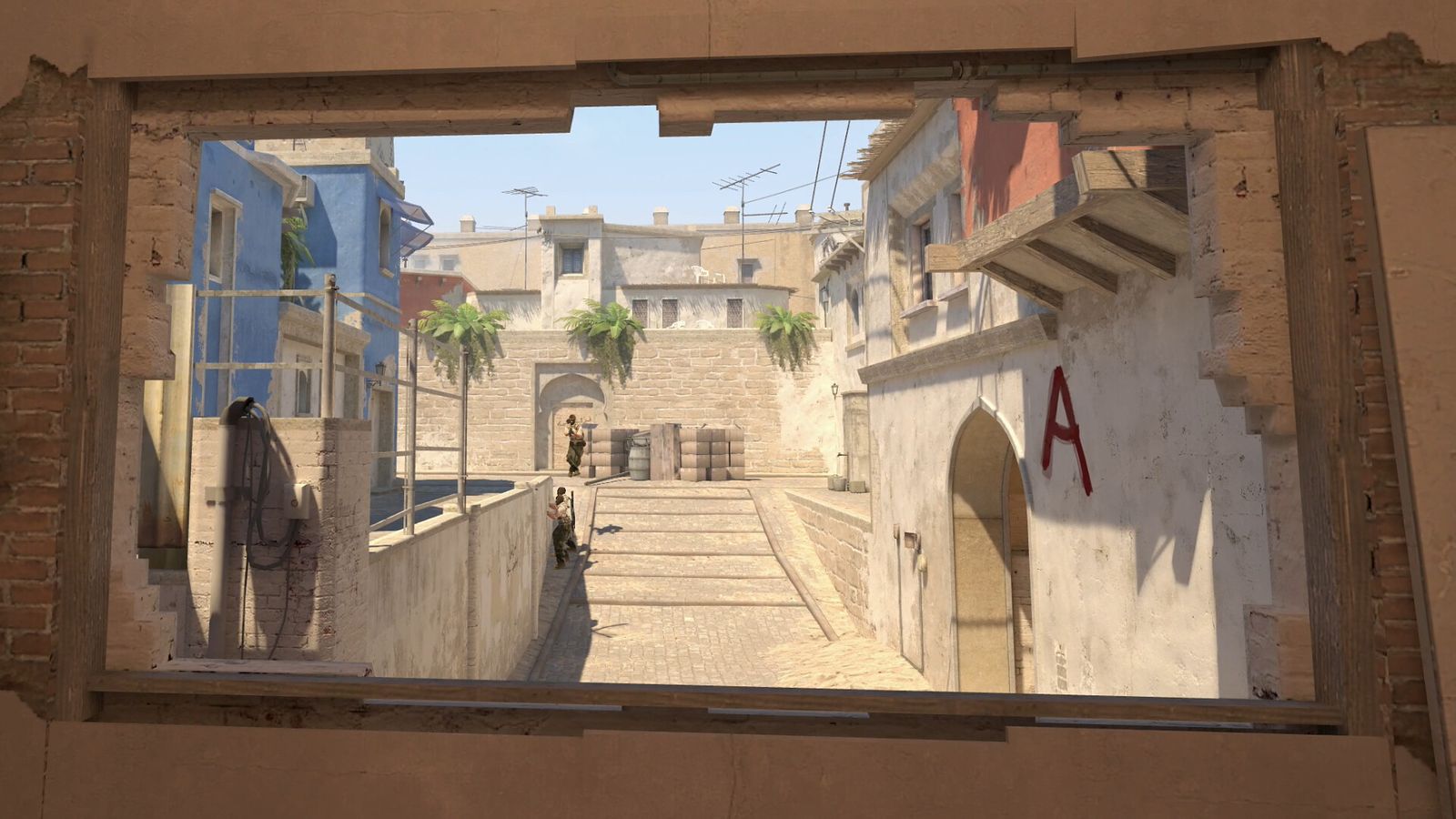 A CS2 player in a hoodie aiming an AK-47 through the window room on Mirage