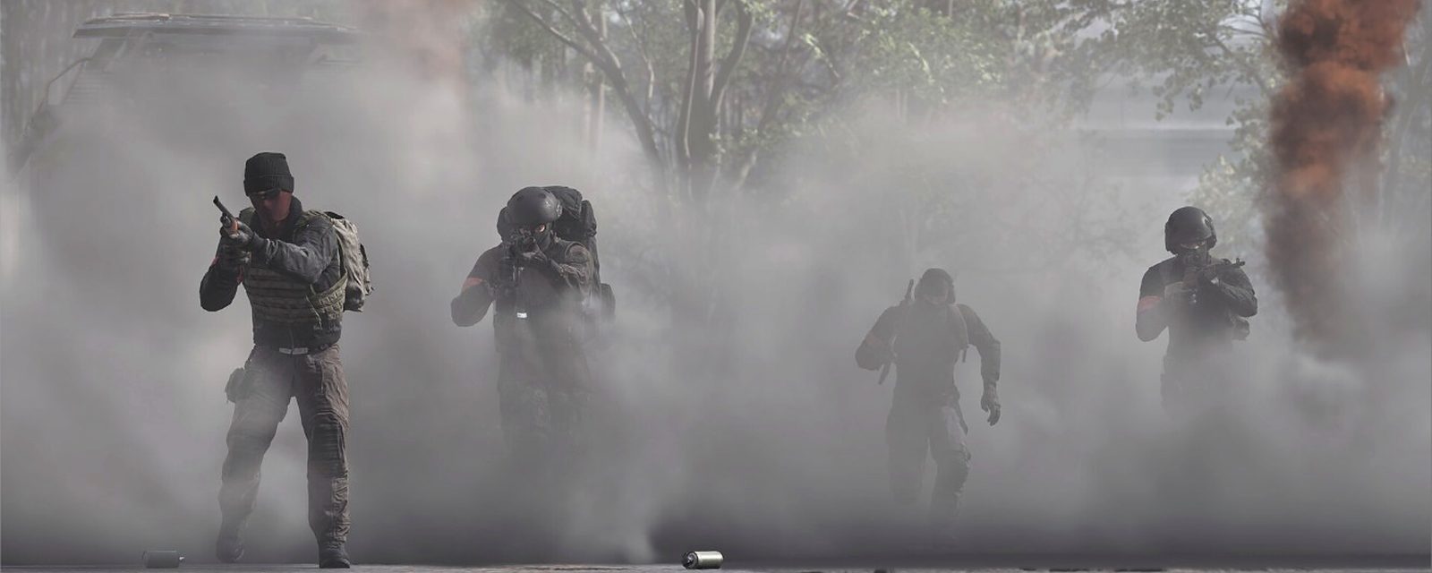 A WARDOGS squad moving through smoke towards the objective