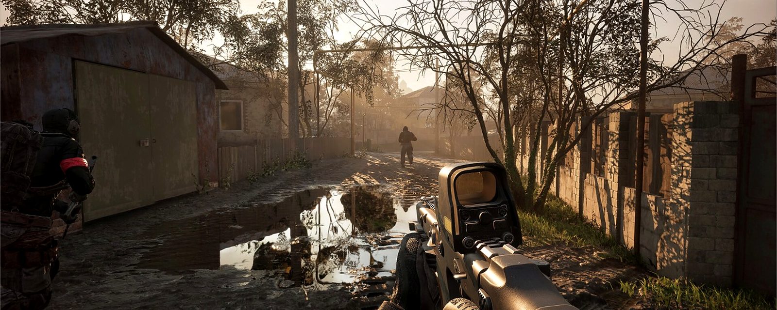 First-person view of a WARDOGS soldier moving through a village street at sunset